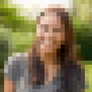 pixelated image of a woman smiling